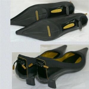 RARE Nike x Cole Haan black soft leather pumps.